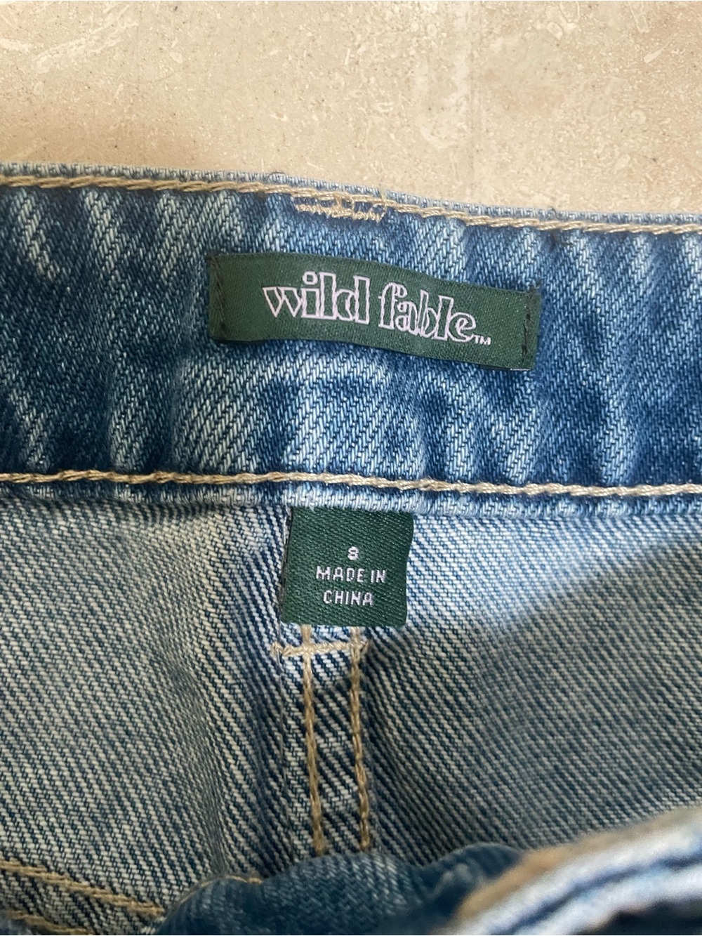 Wild Fable blue low-rise baggy jeans with green label